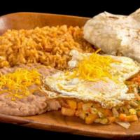 Huevos Rancheros · Two eggs over easy with pico de gallo served with rice and beans.

Consuming raw or undercoo...