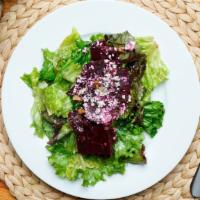 Beet Salad · Fresh beets roasted walnuts, blue cheese served on a bed of greens with shallot balsamic vin...