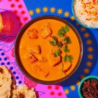 Butter Chicken · Marinated chicken in a buttery tomato sauce. with basmati rice