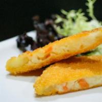 Croquette · Lightly breaded danshaku potato croquette served with tonkatsu sauce.