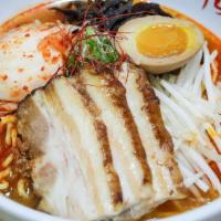 Spicy Ramen · Natural Heritage Berkshire Pork bone soup (tonkotsu) with chicken and seafood broth with wav...