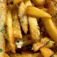 Truffle Fries · classic fries, truffle oil, parmesan, red pepper flakes, garlic