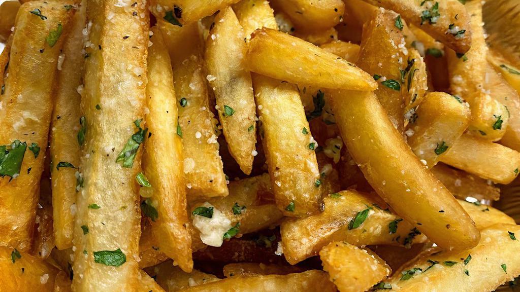 Truffle Fries · classic fries, truffle oil, parmesan, red pepper flakes, garlic