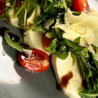 Caprese Salad · sliced tomato, mozz, basil, balsamic glaze