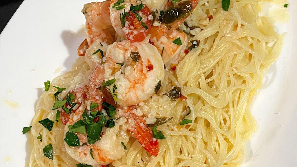 Shrimp Scampi · jumbo shrimp, linguini, lemon butter wine sauce, sundried tomatoes