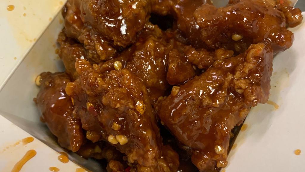 General Tso'S Chicken (Hot) · Spicy battered chicken in a spicy-sweet brown sauce.