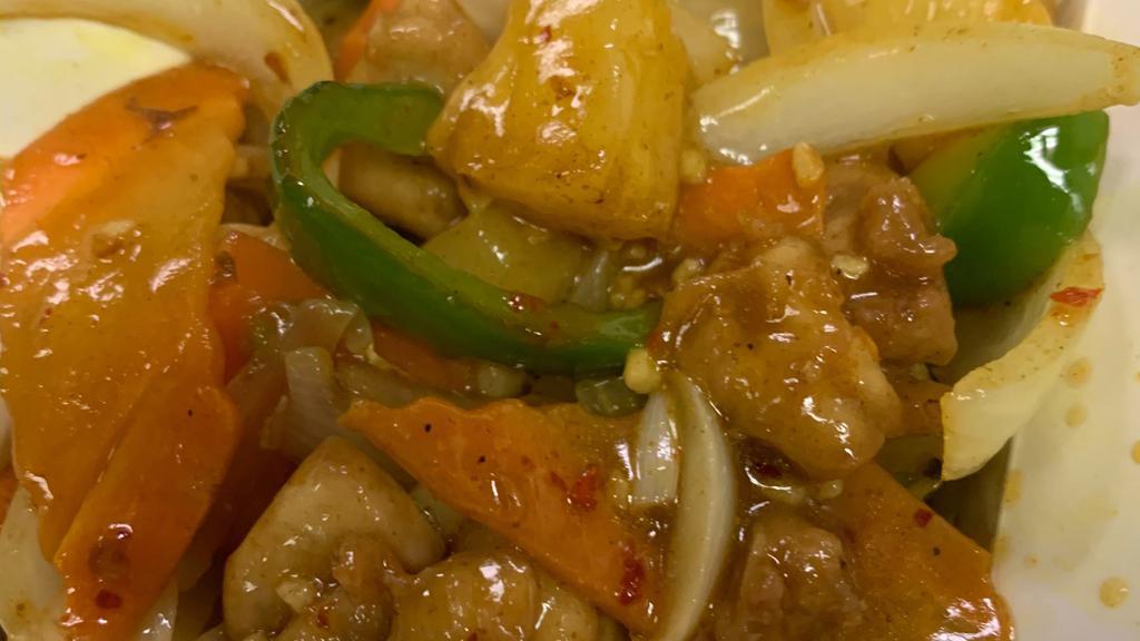 Polynesian Chicken Curry · Spicy pineapple, green peppers, and onions in a curry sauce.