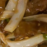 B 2. Pepper Steak · Tender beef stir-fried win green peppers and onions in a brown sauce.