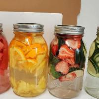 Water Fresh Fruit Detox · water with fresh fruit  you can mix your 3 favorite fruits 
Orange,pineapple, watermelon,cuc...
