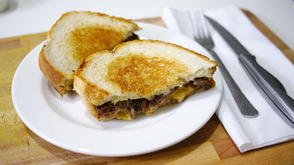 Patty Melt · A 1/2 pound. Burger patty topped with melted swiss and American cheese and sautéed onions on grilled rye bread.