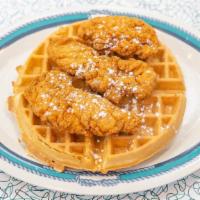 Chicken & Waffles · Our special Belgian waffle topped with 3 pieces of chicken strips. Served with fries. Add tw...