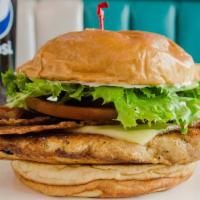 Chicken Club · Grilled chicken breast, bacon, swiss cheese, lettuce, tomatoes, and mayonnaise on a grilled ...