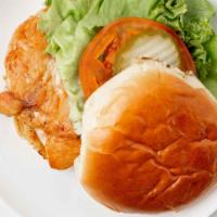 Grilled Chicken Sandwich · Marinated chicken breast grilled to perfection. Served on a bun with lettuce, tomatoes, and ...