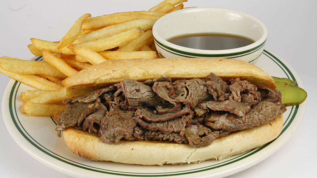 French Dip Hoagie · French dip hoagie beef piled high and covered with swiss cheese. Served with au jus for dipping.