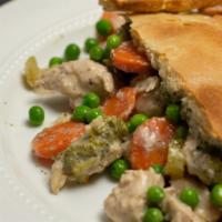 Chicken Pot Pie · Bright vegetables cooked low and slow, dressed in a warm creamy pot pie sauce topped with go...
