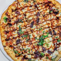 Mediterranean Grilled Pizza · Vegetarian. Garlic, spinach, Kalamata olives, tomatoes, feta cheese, and mozzarella.