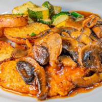 Chicken Marsala · Lightly breaded and pan seared topped with marsala wine and mushroom sauce served with your ...