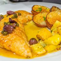 Chicken Piccata · Lightly breaded and pan seared topped with lemon butter sauce served with choice or pasta, o...