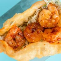 Bang Bang Shrimp Taco · Large shrimp sauteed with spicy garlic sauce. On a bed of our homemade coleslaw. Served on a...