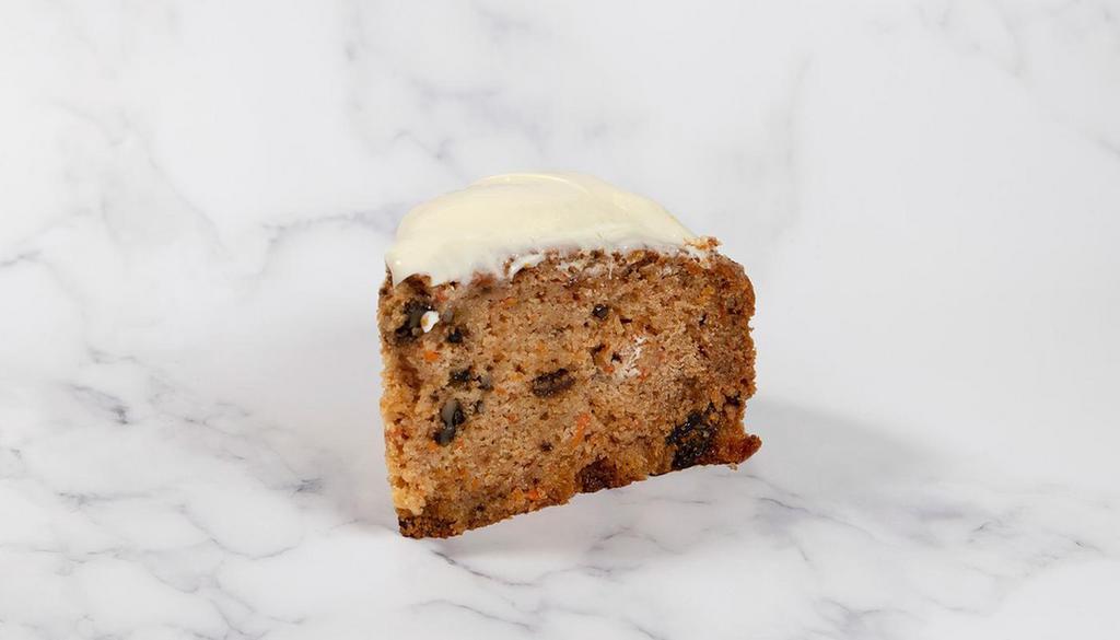 Carrot Cake · A carrot cake with raisins and walnuts