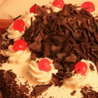 Black Forest · Dark chocolate cake with cherry brandy, filled with one layer of cherries and one layer of w...