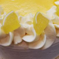 Lemon · Light and delicious. Yellow cake with lemon flavor and lemon buttercream icing. Decorated wi...