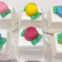 6 Petit Fours · A square of yellow cake with orange buttercream filling, a layer of marzipan, then dipped in...