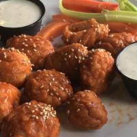 Boneless Wings · All white meat boneless wings tossed in one of our signature sauces, sprinkled with toasted ...