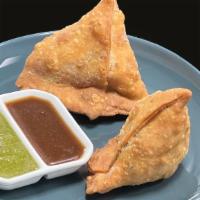 Samosa (2) · Shortcrust Pastry stuffed with Indian spiced diced potatoes and green peas - Deep Fried, *se...