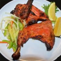 Old Fashioned Tandoori Chicken · 1/2 Chicken -  Leg quarter & Breast  marinated in Indian herbs & yogurt