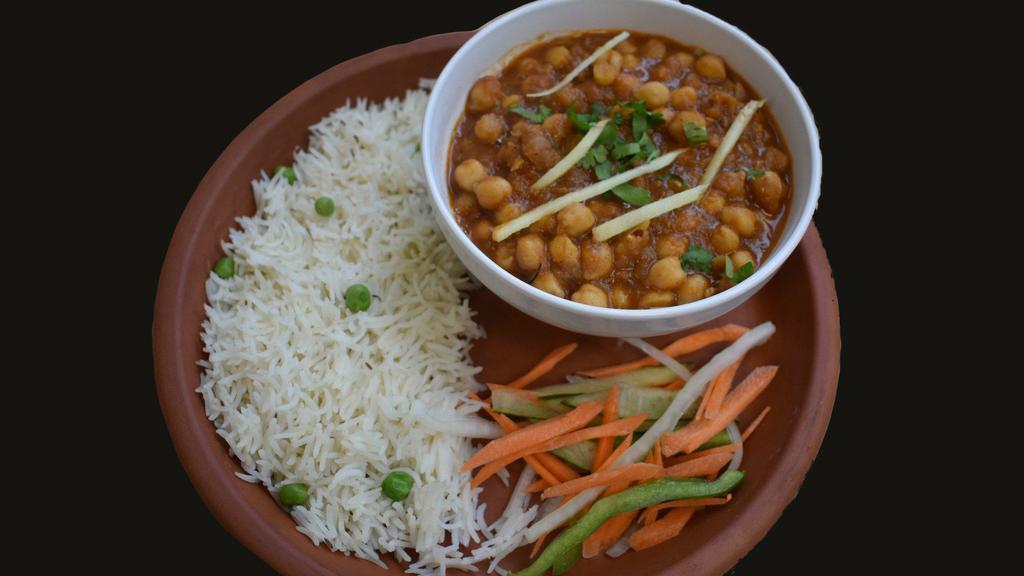 Chole Masala · Chickpeas cooked w/ onion, tomatoes and Indian herbs