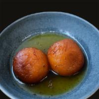 Gulab Jamum · Deep fried Milk doughnut balls marinated in sugar syrup with saffron & cardamom