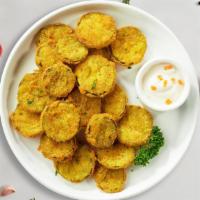 Golden Pickle · Fresh dill pickles sliced length-wise into quarters, breaded, and fried until golden brown. ...
