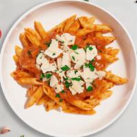 Vodka Cream Pasta (Penne) · Fresh penne pasta served with a smooth creamy tomato sauce and your choice of toppings.