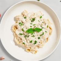 Classic Alfredo Chicken Pasta (Fettuccine) · Classic alfredo sauce based pasta cooked with grilled chicken and fresh fettuccine.