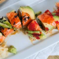 Yummy Roll · Spicy salmon, cucumber, scallion and roe topped with salmon, avocado, roe and eel sauce.