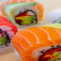 Rainbow Roll · Crab stick, avocado, roe and assorted fish.