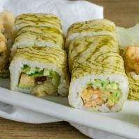 Dark Side Spider Roll · Whole soft shell crab tempura, cucumber, lettuce, eel sauce, and spicy mayo rolled with spec...