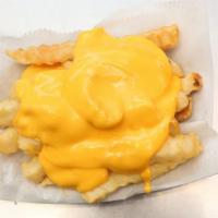 Cheese Fries · Golden brown French fries topped with melty cheese.