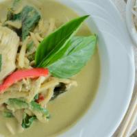 Green Curry · Spicy. Choice of chicken, beef, or pork in a Thai style curry with bamboo shoots, red and gr...