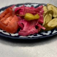 Assortment Of Pickled Vegetables · Pickled cabbage, tomatoes and cucumbers