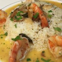 Shrimp Scampi · Sautéed in butter and garlic with lemon and white wine.
