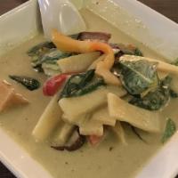 Green Curry · Green curry paste in coconut milk with zucchini, Thai eggplant, fresh basil and bell pepper
