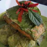 Salmon Green Curry · Grilled salmon in green curry paste and coconut milk with zucchini, Thai eggplant, fresh bas...