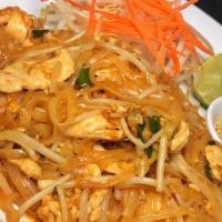 Pad Thai · Stir-fried rice noodles, egg, tamarind juice, bean sprouts, green onions, and crushed peanut...