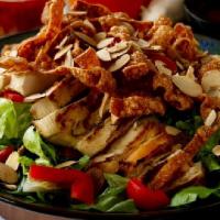 Sesame Chicken Salad · Chicken breast, wontons, red bell peppers, slivered almonds, romaine lettuce, and sesame dre...