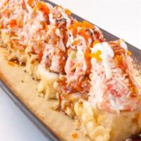 M.G · In: deep fried ca roll, scallop, spicy tuna, crab, green onion, and tobiko.