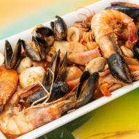 Levantamuertos · Sauteed Jumbo Shrimp, octopus, Squid, Crab, Mussels, and Clams in our homemade garlic chef s...