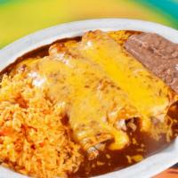 #3 Three Chicken Fajita Enchiladas · Served with Mexican rice and refried beans.