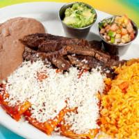 #20 Enchiladas Mexicanas  · 3 Queso Fresco Filed Enchiladas, topped off with our Homemade Chile Ancho Sauce, finished of...